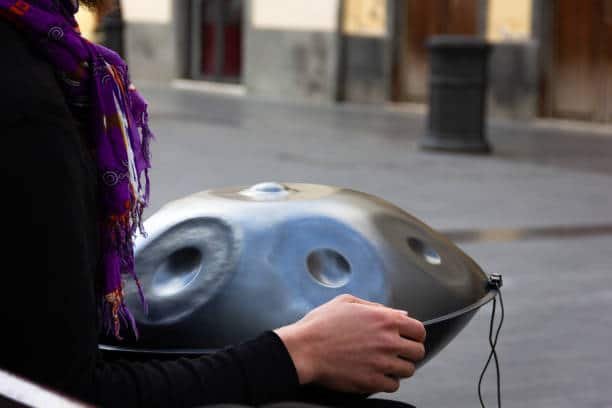 street musician performing with handpan